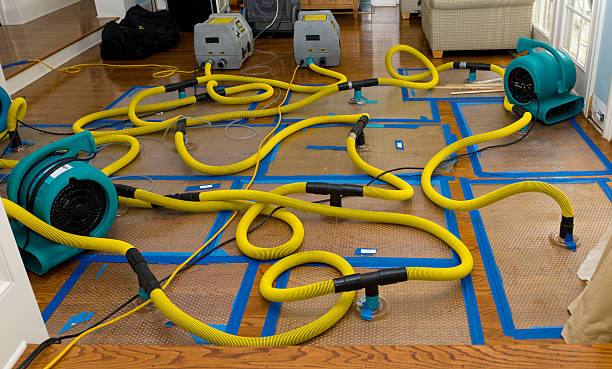 Professional Flood Damage Restoration technician working in Monticello, MS